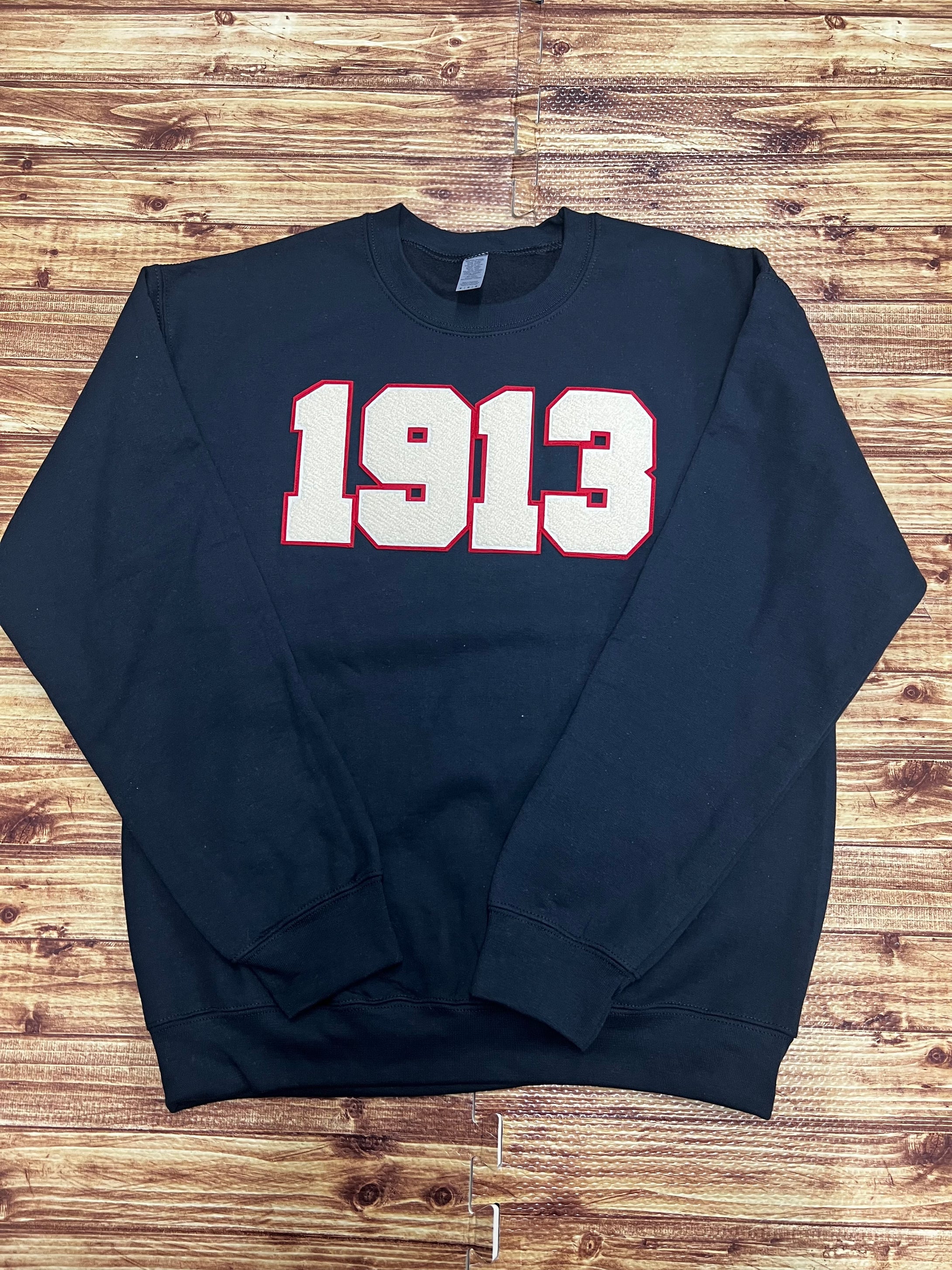 Black sweatshirt with cream and red Chenille 1013